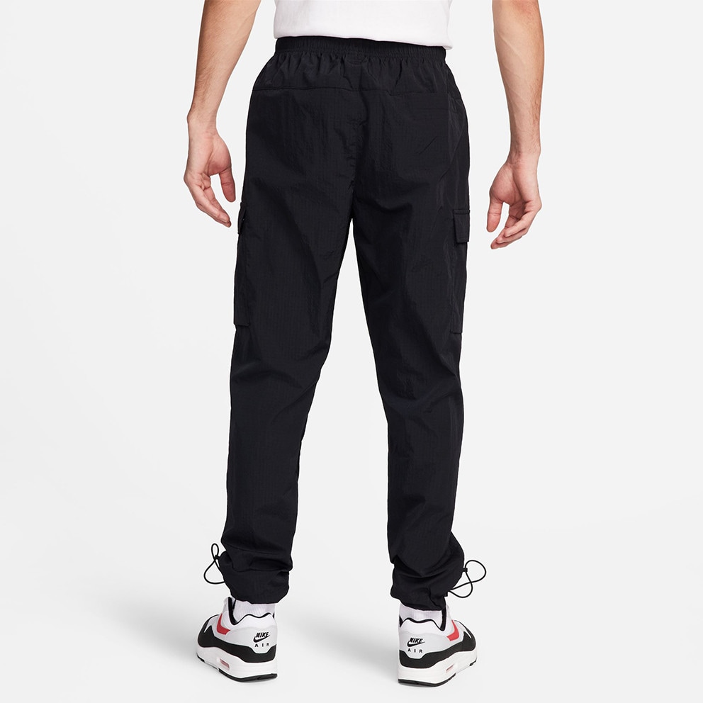 Nike tuned air track pants deals